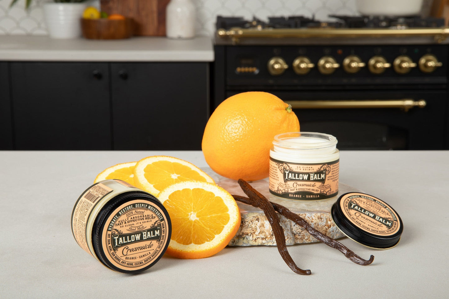 Creamy tallow balm with creamsicle scent by Roots and Leaves LLC, showing the soothing balm in a jar