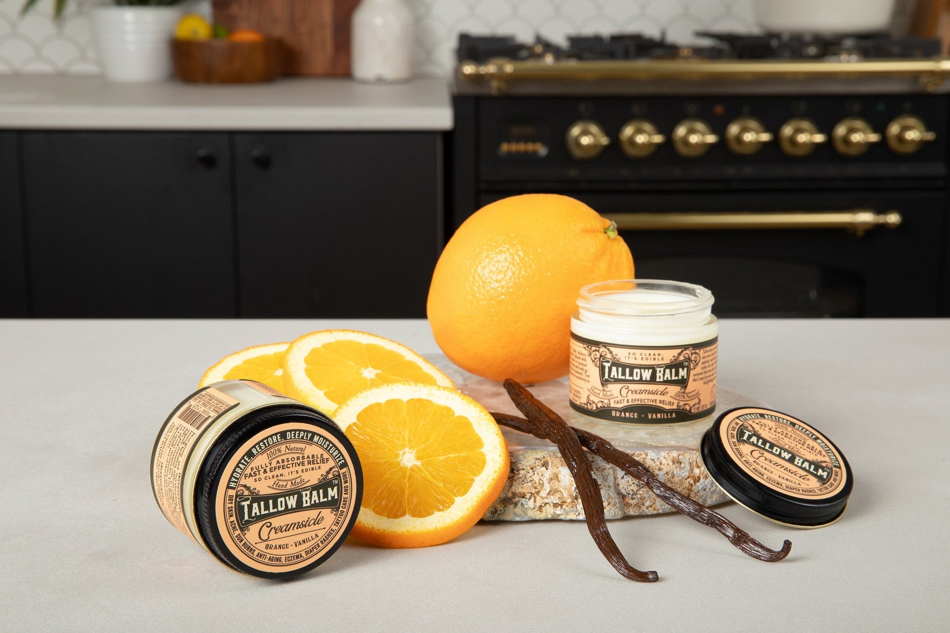 Creamy tallow balm with creamsicle scent by Roots and Leaves LLC, showing the soothing balm in a jar