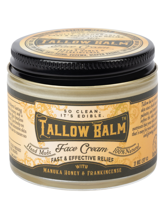 Tallow face cream with Manuka honey and castor oil by Roots and Leaves LLC, showing the creamy texture and natural ingredients.