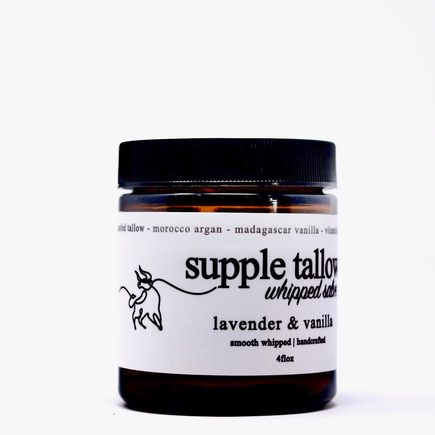 Roots Apothecary lavender vanilla supple tallow salve in a 2oz jar, showing the creamy texture and soothing herbal ingredients.