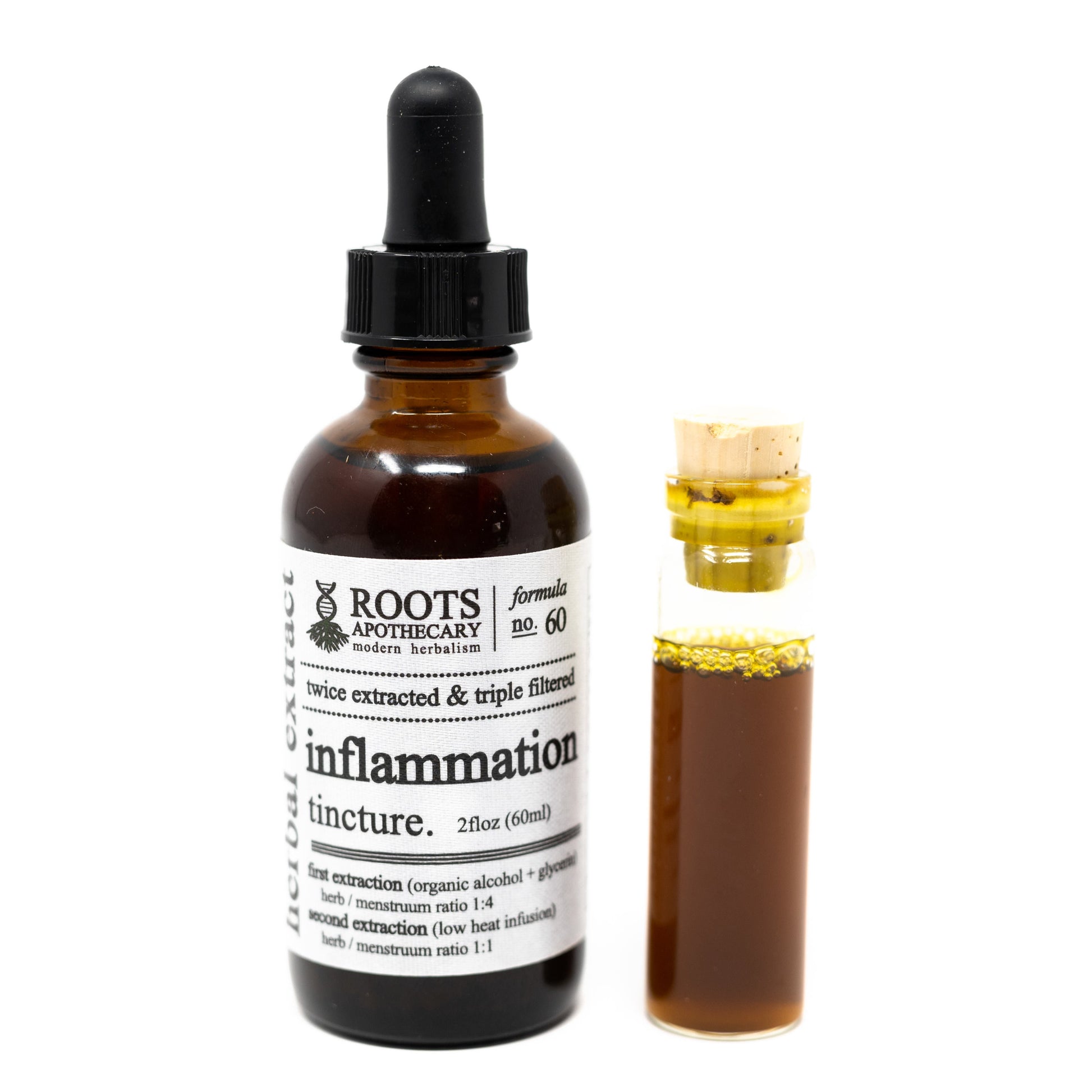Roots Apothecary inflammation tincture bottle with dropper, showing label and dark glass bottle for herbal tincture.