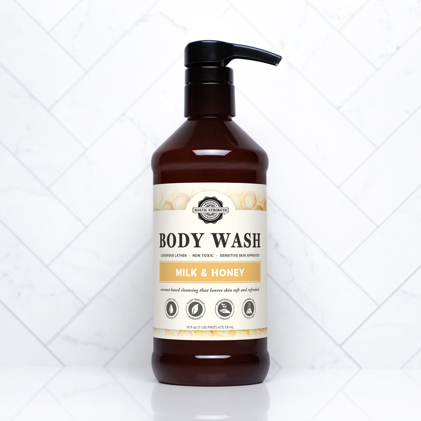 Rustic Strength Milk & Honey Moisturizing Body Wash in a 16 oz bottle, featuring a gentle, nourishing formula for soft skin.