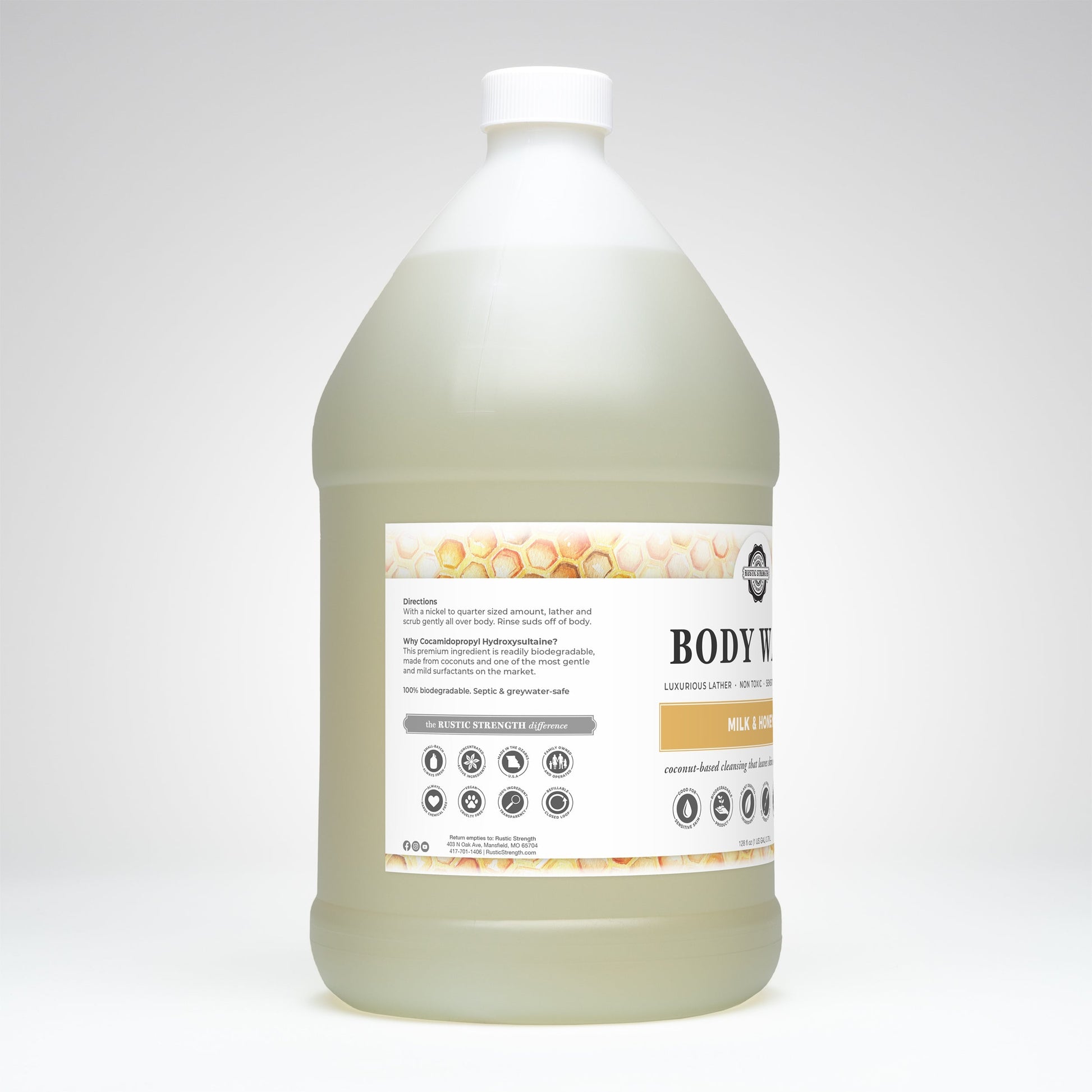 Rustic Strength Milk & Honey Moisturizing Body Wash in a 16 oz bottle, featuring a creamy, nourishing formula for soft skin.