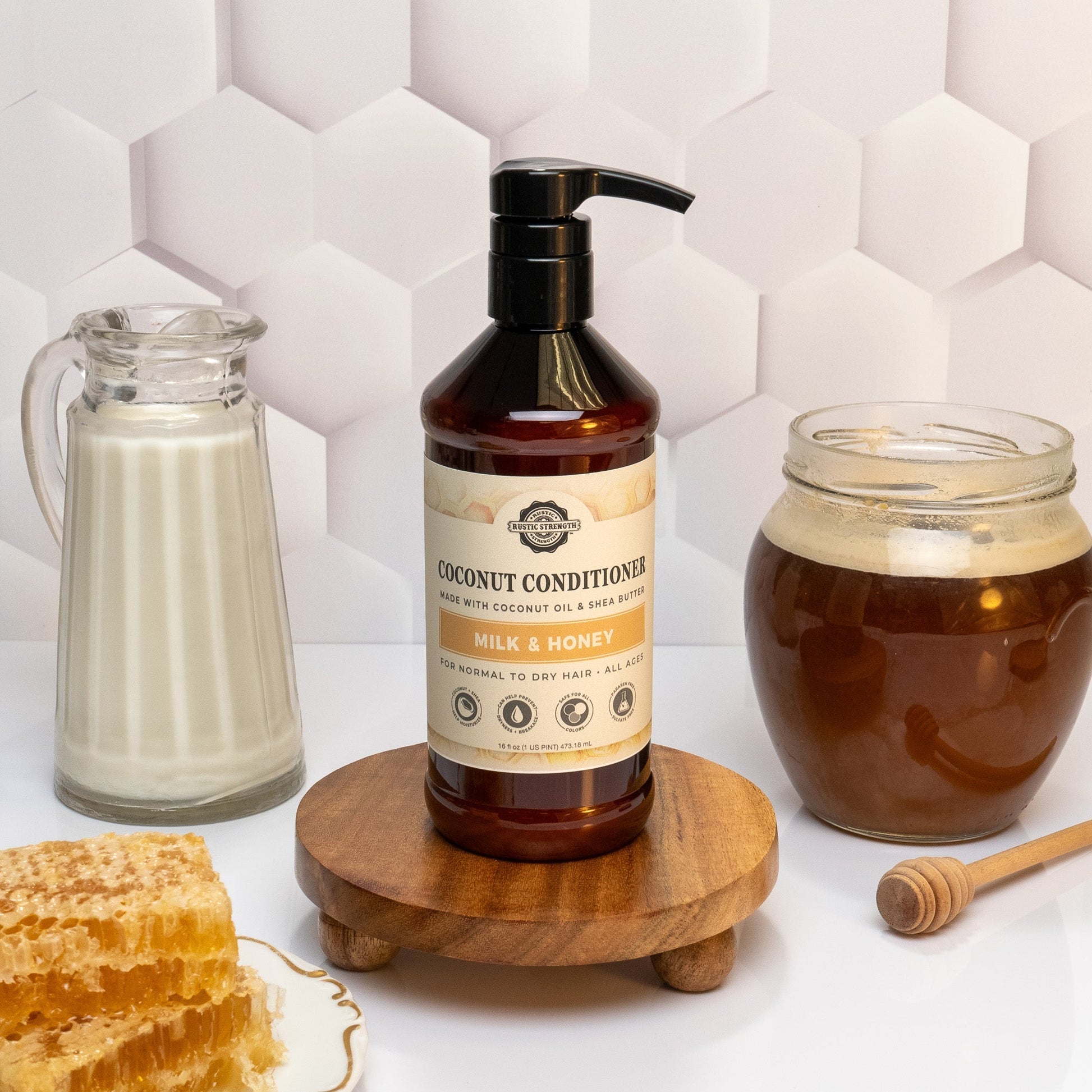 Rustic Strength Coconut Conditioner with Milk and Honey, 16 oz bottle, creamy formula for nourishing hair.