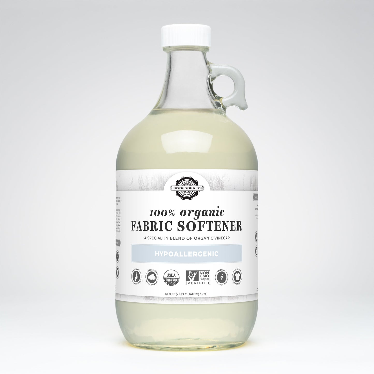 Rustic Strength Organic Fabric Softener in a 24 oz glass bottle, used for laundry to soften and freshen clothes naturally.