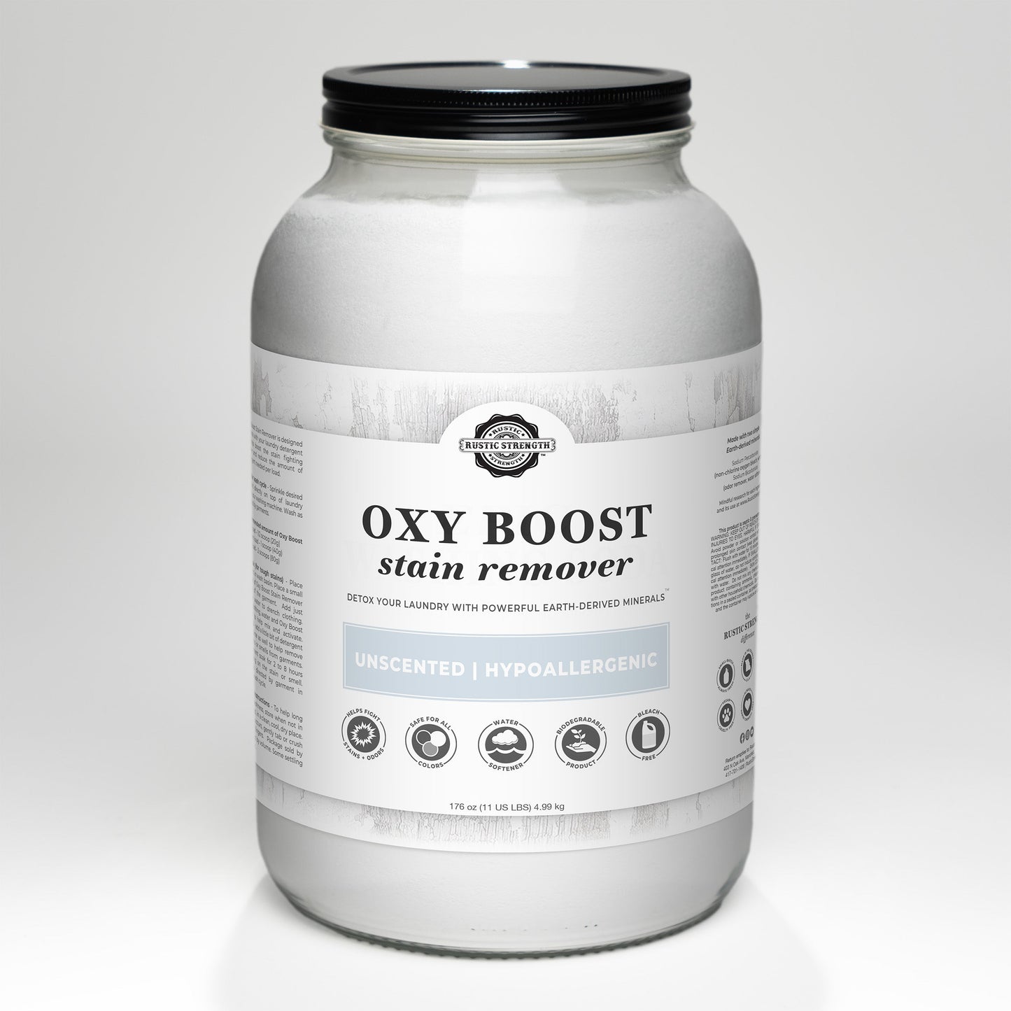 Rustic Strength Oxy Boost Stain Remover in a 2 lb container, laundry booster for tough stains with bright orange and white packaging.