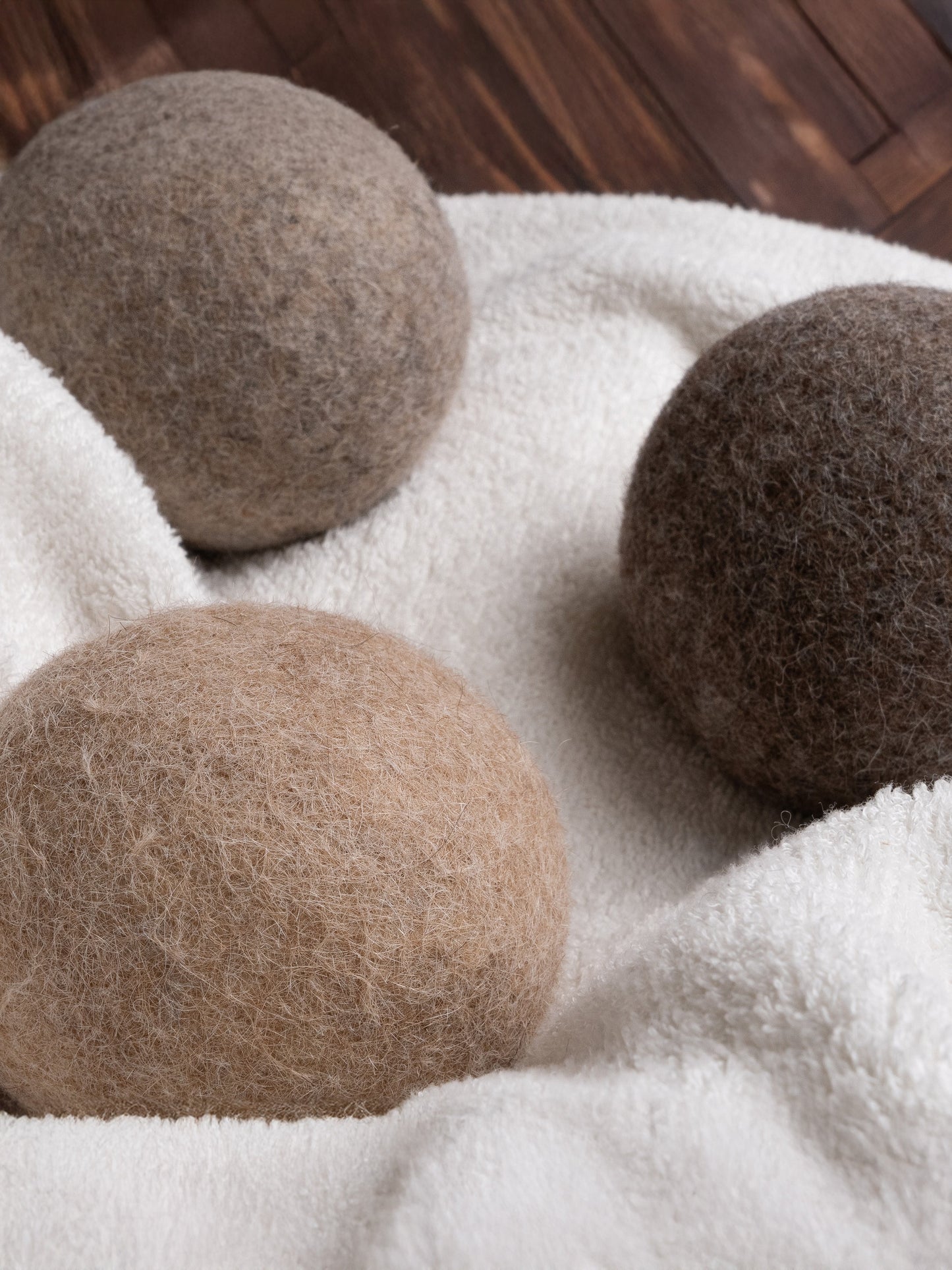 Rustic Strength alpaca dryer balls 3-pack for laundry, softening clothes naturally and reducing drying time.