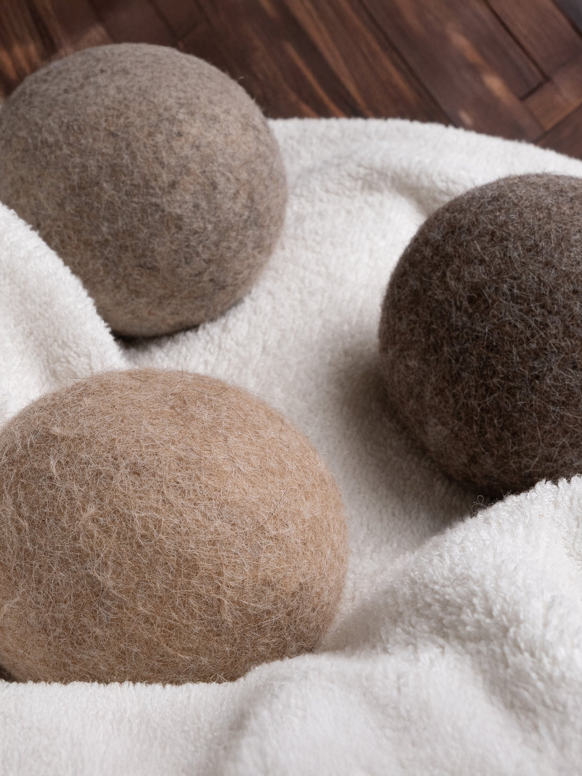 Rustic Strength alpaca dryer balls 3-pack for laundry, softening clothes naturally and reducing drying time.
