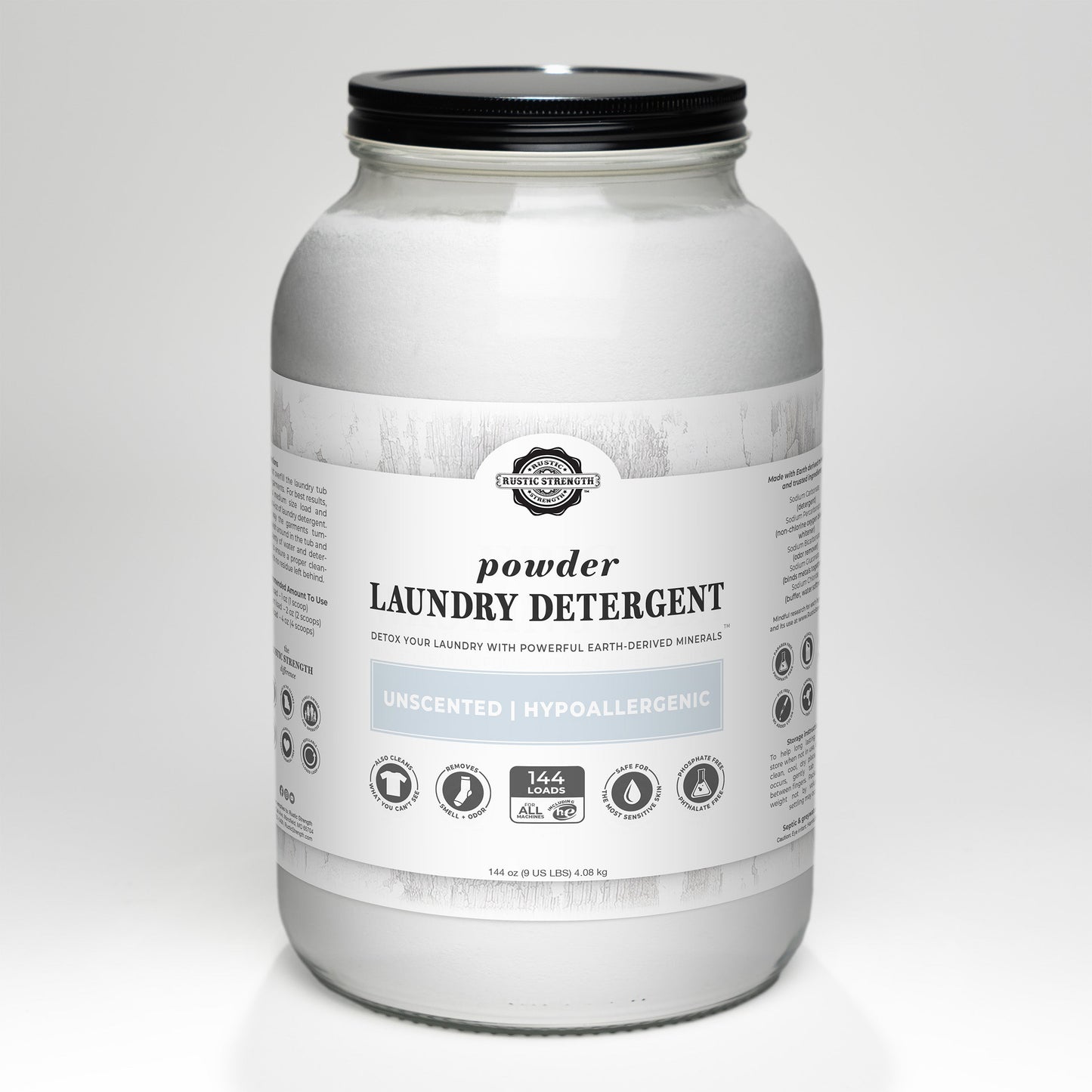 Rustic Strength Powder Laundry Detergent in a 2-pound container, showing the white powder and label details.