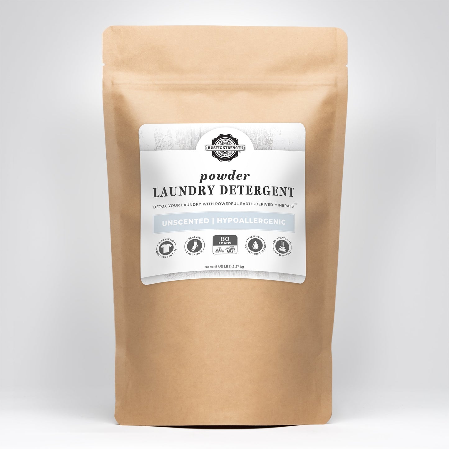 Rustic Strength Powder Laundry Detergent in a 2-pound bag, showing the white powder inside a clear bag.