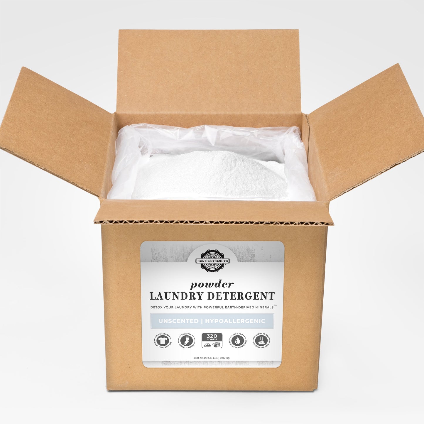 Rustic Strength Powder Laundry Detergent in a 2 lb bag, showcasing the white powder and label on the packaging.
