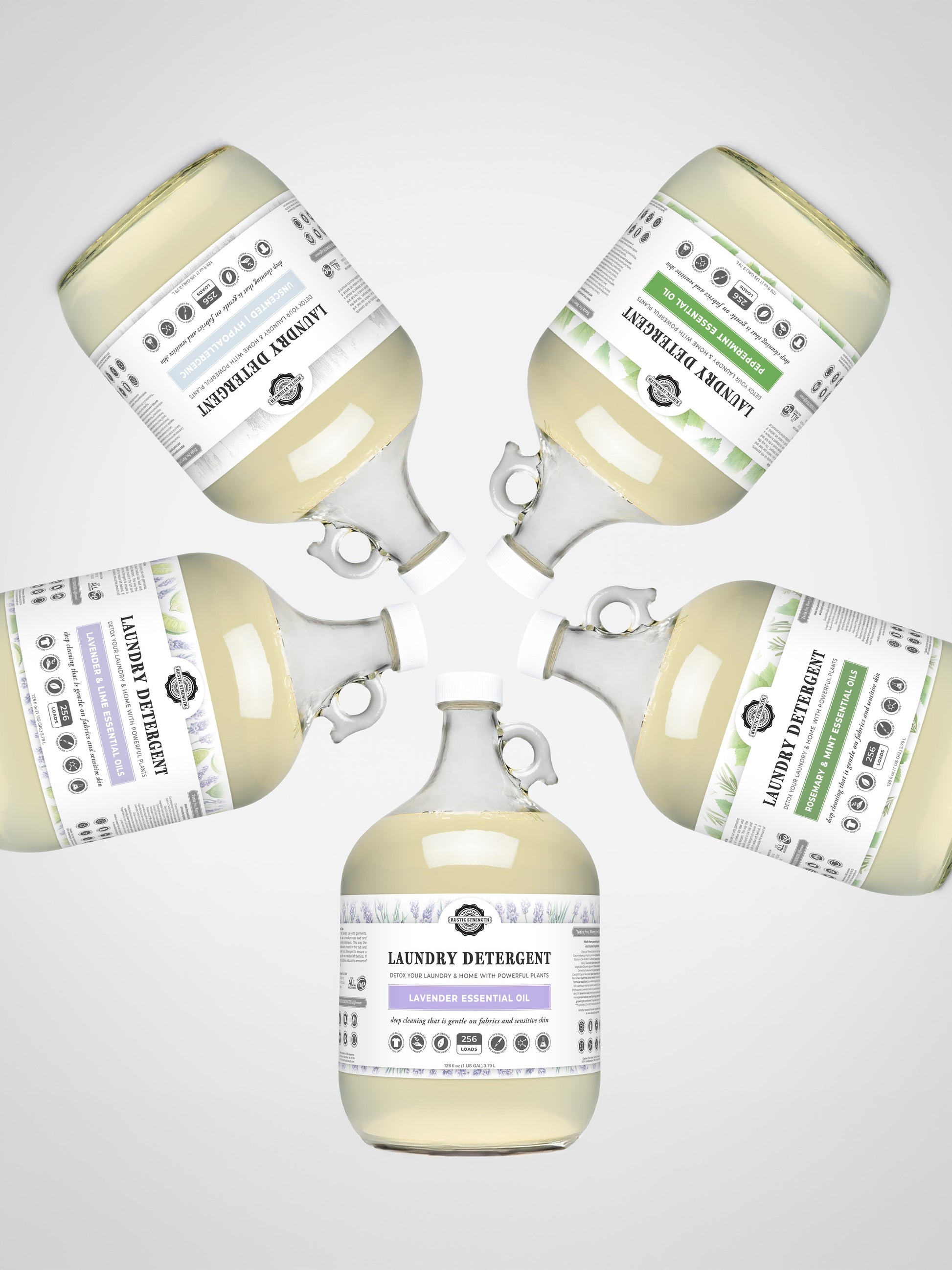 Rustic Strength Fresh Linen laundry detergent in 24 oz glass bottle, showing the liquid detergent and label.