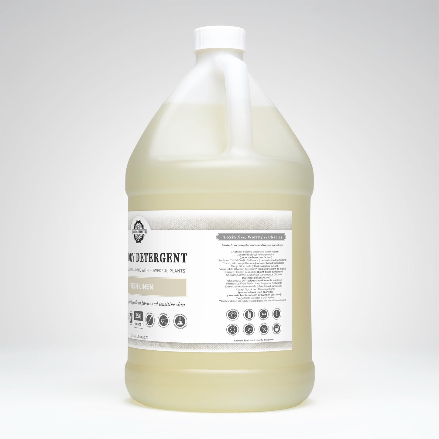 Rustic Strength Fresh Linen laundry detergent in a 24 oz glass bottle, showing the label and product packaging.