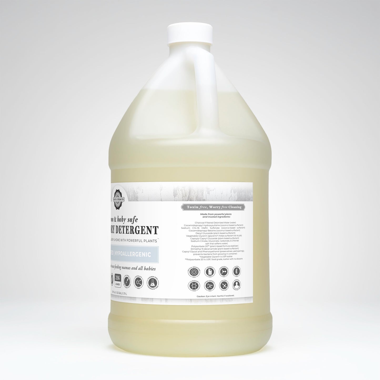 Rustic Strength laundry detergent in a 24 oz glass bottle, safe for mama and baby, with natural, eco-friendly cleaning ingredients.