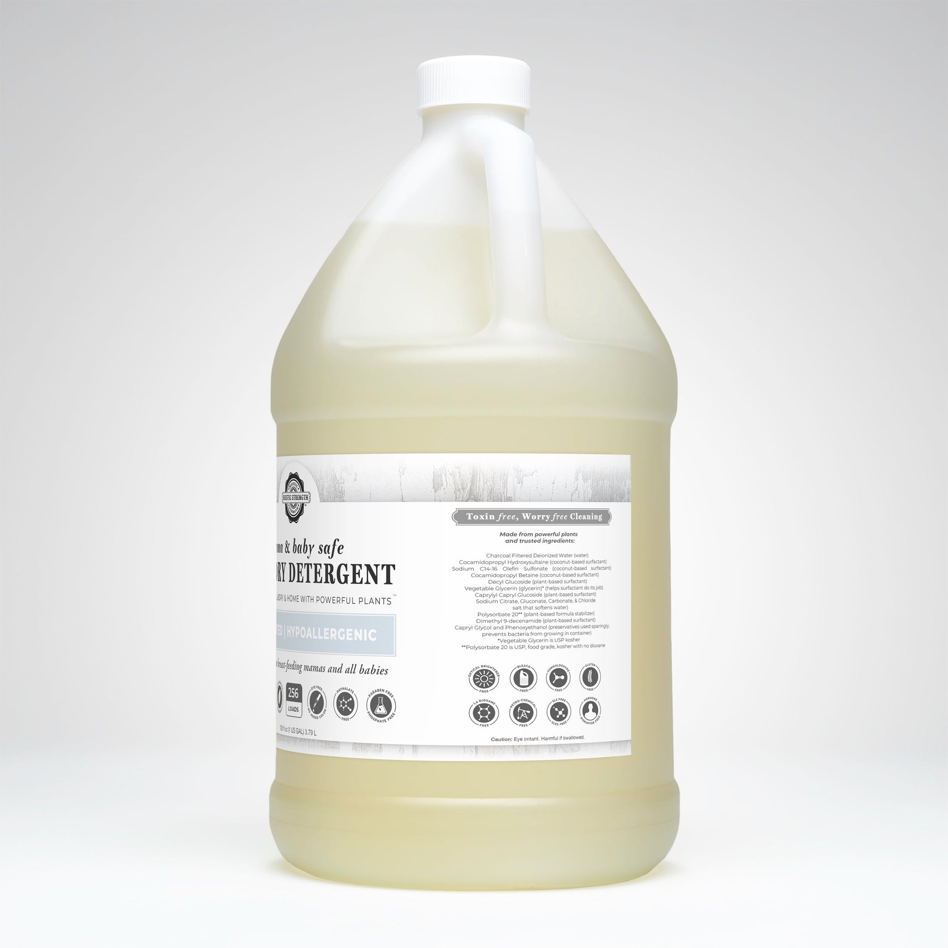 Rustic Strength laundry detergent in a 24 oz glass bottle, safe for mama and baby, with natural, eco-friendly cleaning ingredients.