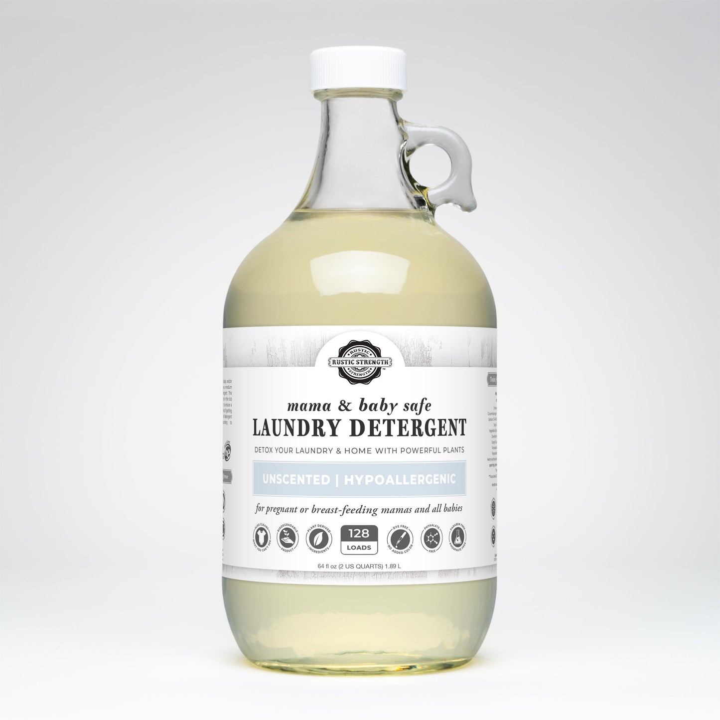 Rustic Strength laundry detergent in 24 oz glass bottle, mama and baby safe, gentle cleaning for delicate fabrics.