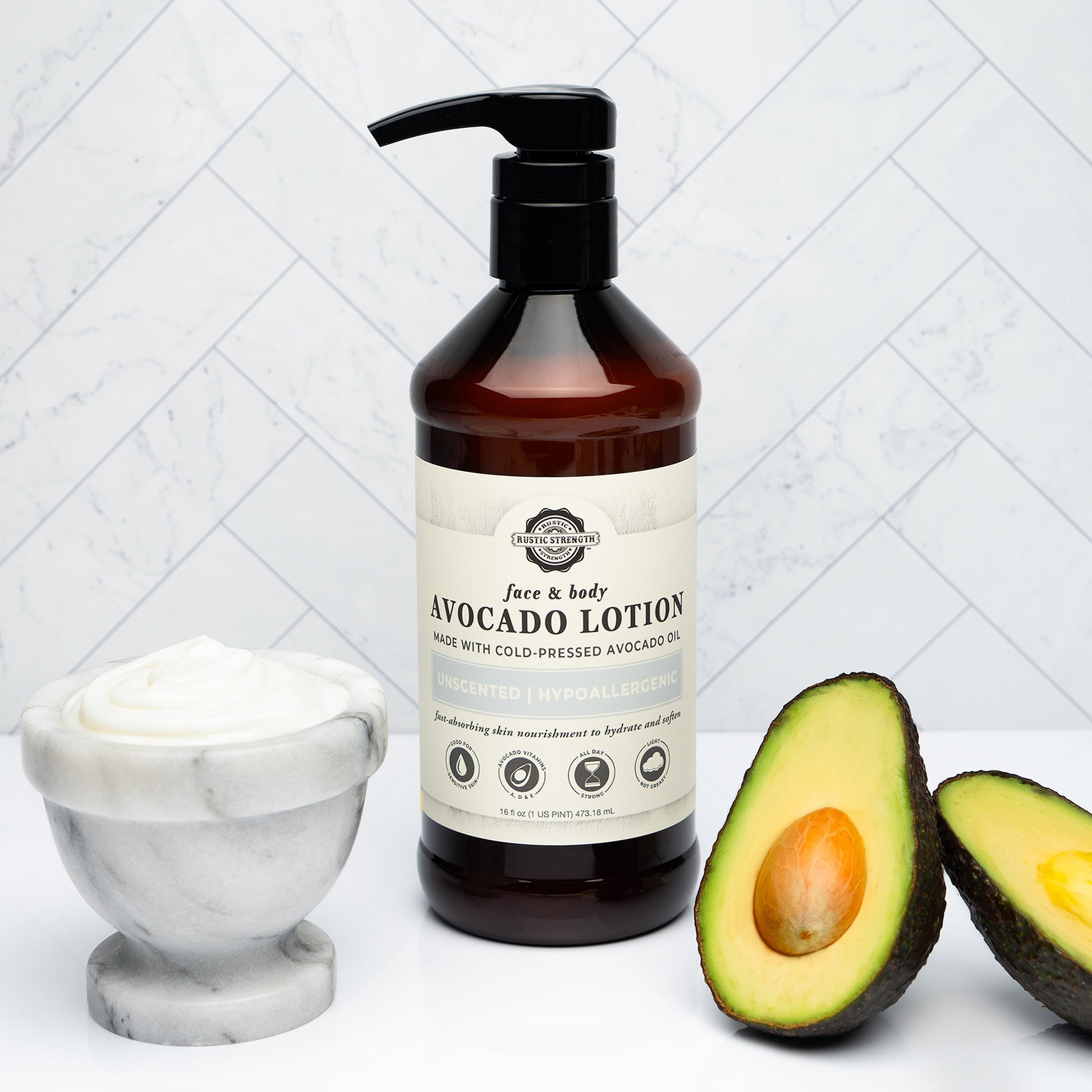 Rustic Strength Avocado Lotion with Milk & Honey, 16 oz bottle showing creamy lotion in a natural setting.