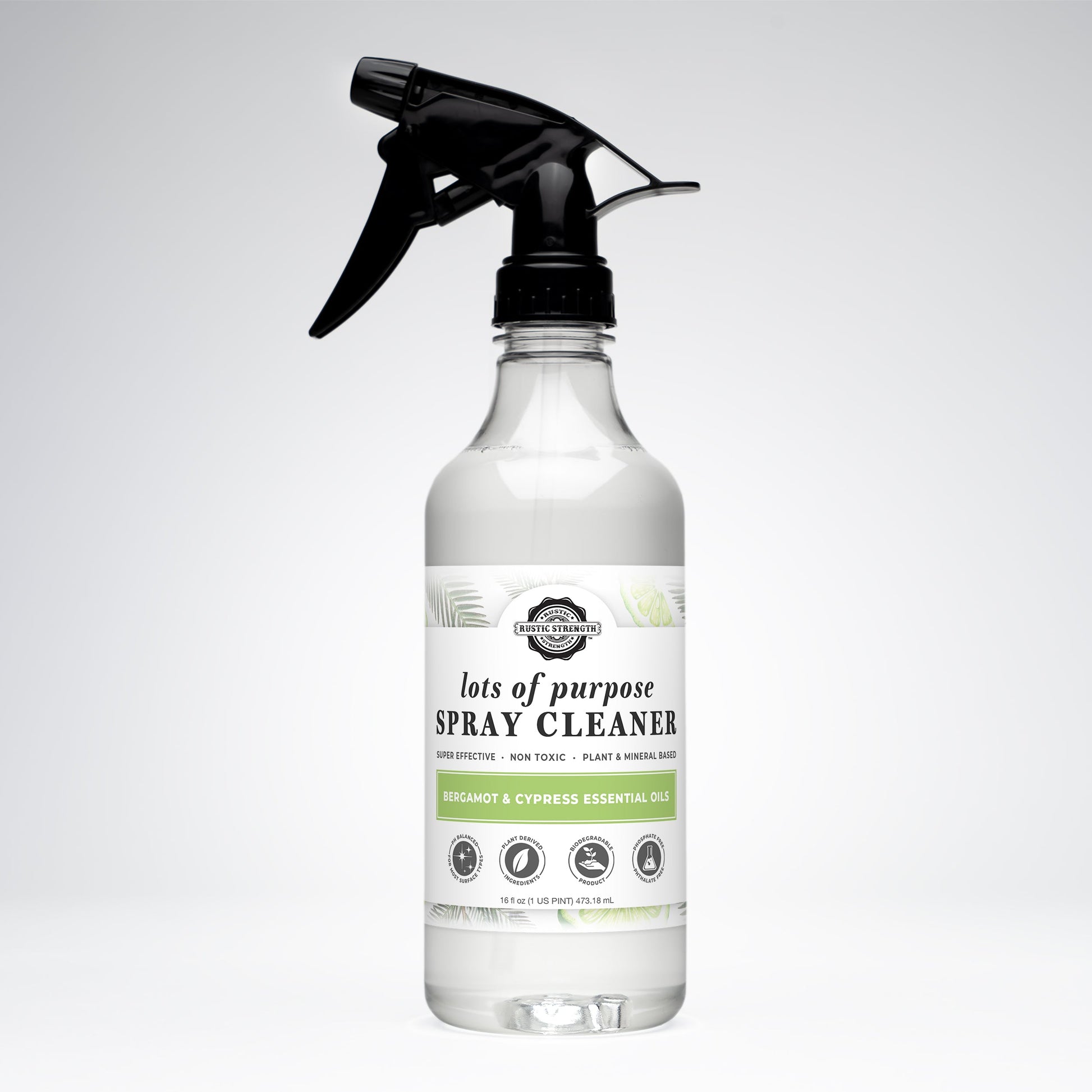 Rustic Strength multi-purpose spray cleaner with bergamot and cypress scent in a 16 oz bottle, suitable for cleaning various surfaces.