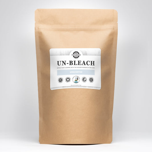 Rustic Strength Un-Bleach multi-purpose cleaner in a 2 lb container, designed for versatile household cleaning tasks.