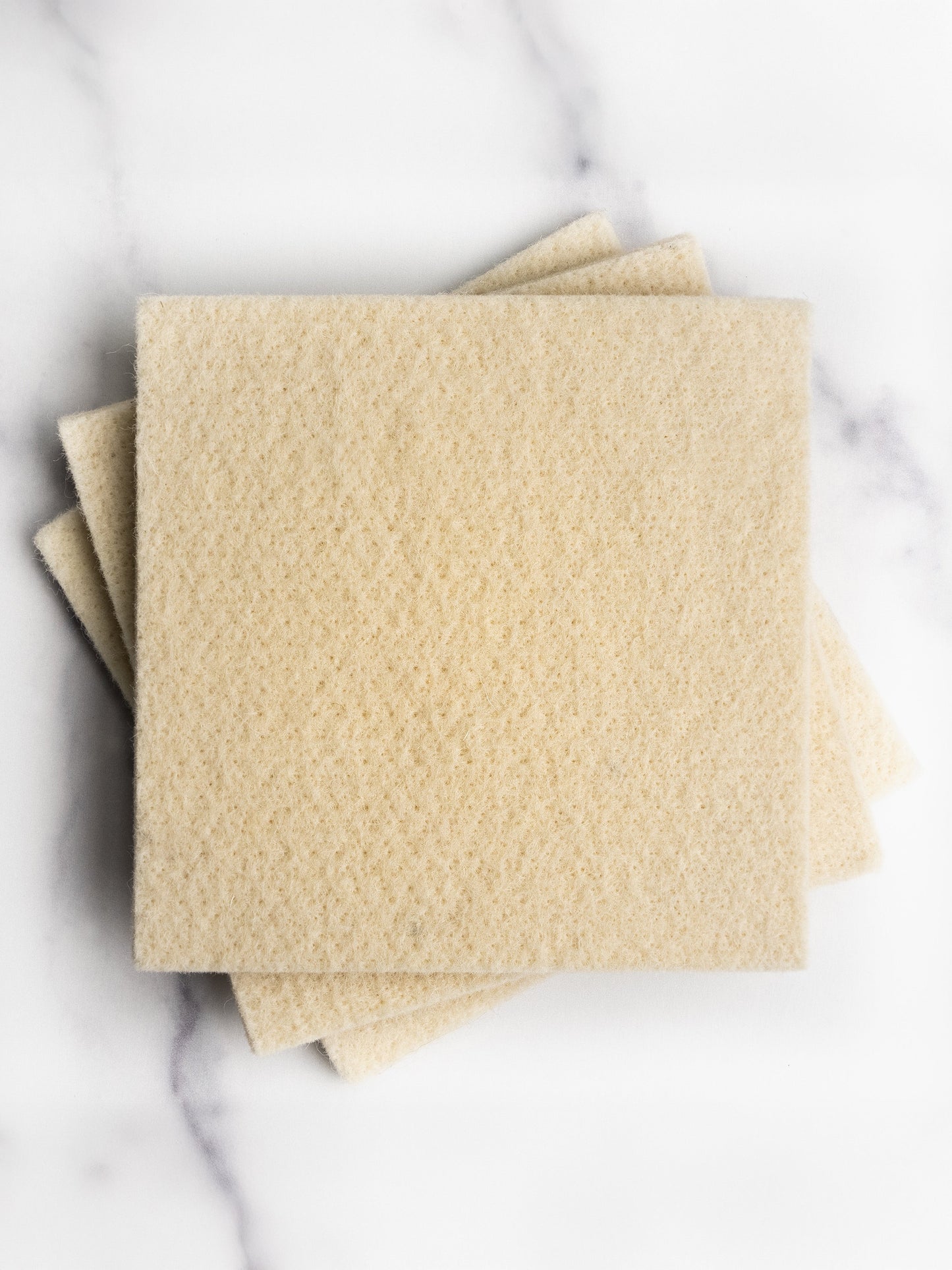 Rustic Strength sustainable wool scrub for multi-purpose cleaning, showing a close-up of the eco-friendly wool scrubber.