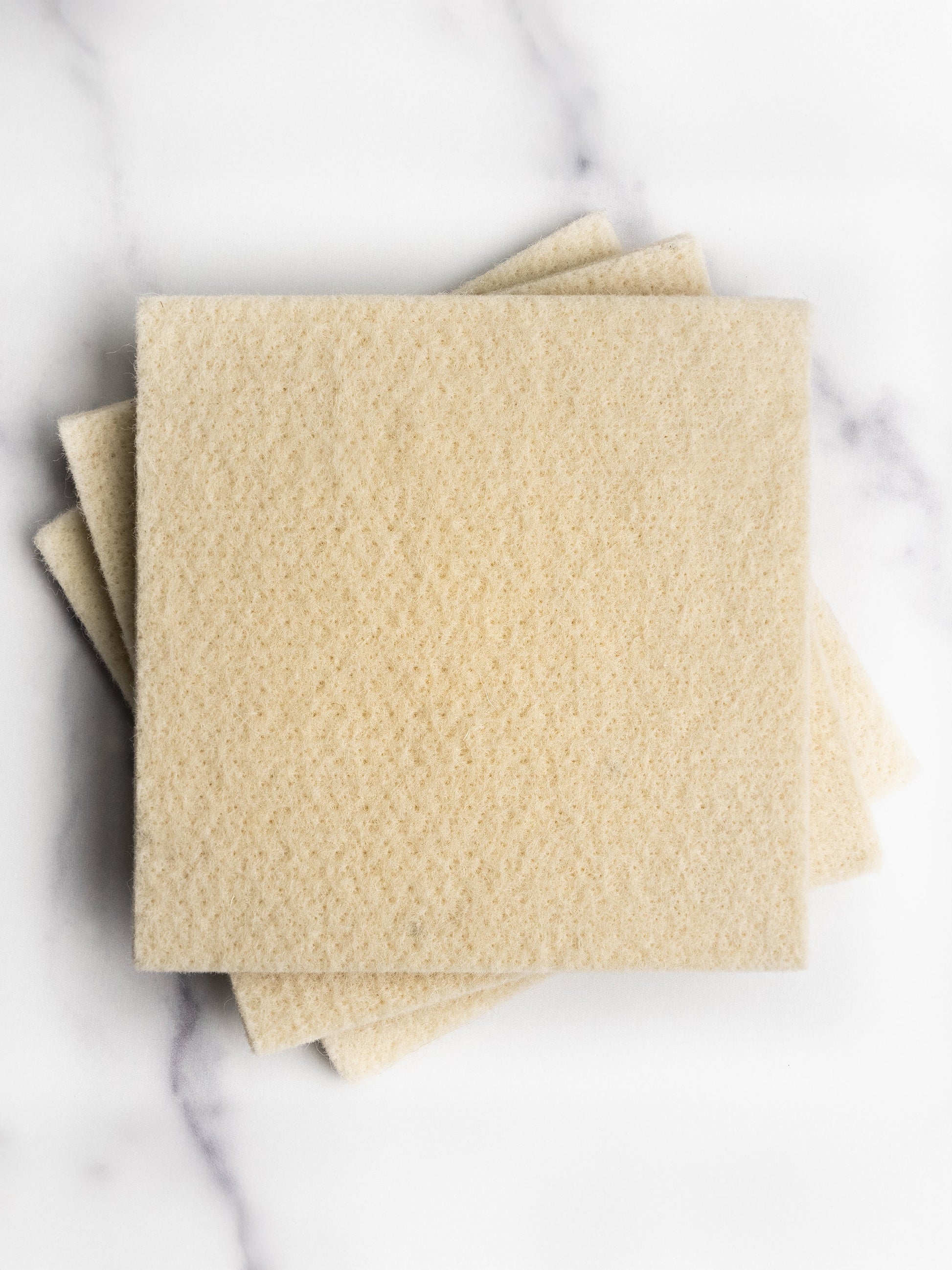 Rustic Strength sustainable wool scrub for multi-purpose cleaning, showing a close-up of the eco-friendly wool scrubber.