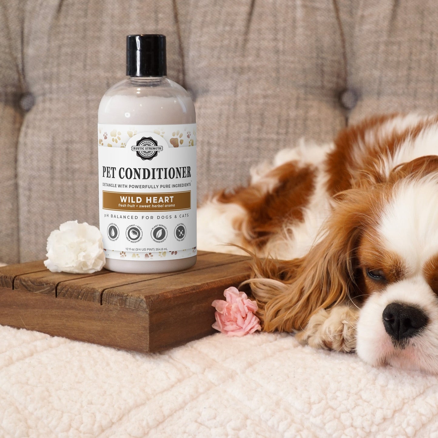 Rustic Strength pet conditioner in a 16 oz bottle, detangles and softens pets' fur, unscented pet care product.