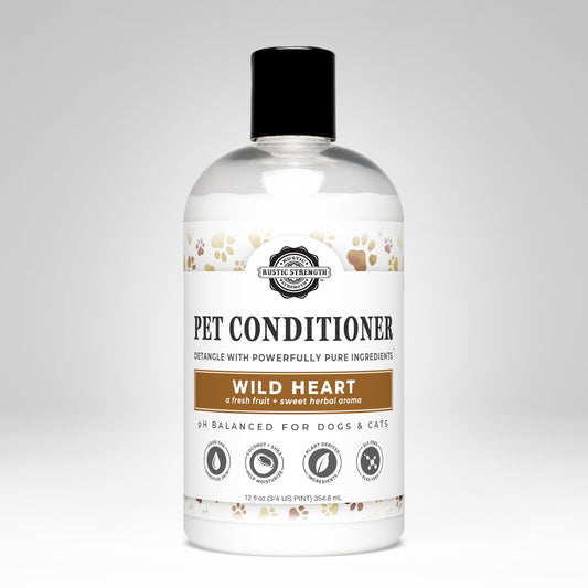 Rustic Strength Wild Heart Pet Conditioner for detangling and softening, shown in a 16 oz bottle for gentle pet care.