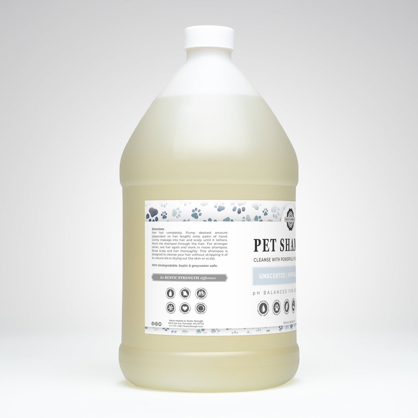 Rustic Strength pet shampoo bottle showing unscented, soothing, deodorizing formula for pets in a 16 oz container.