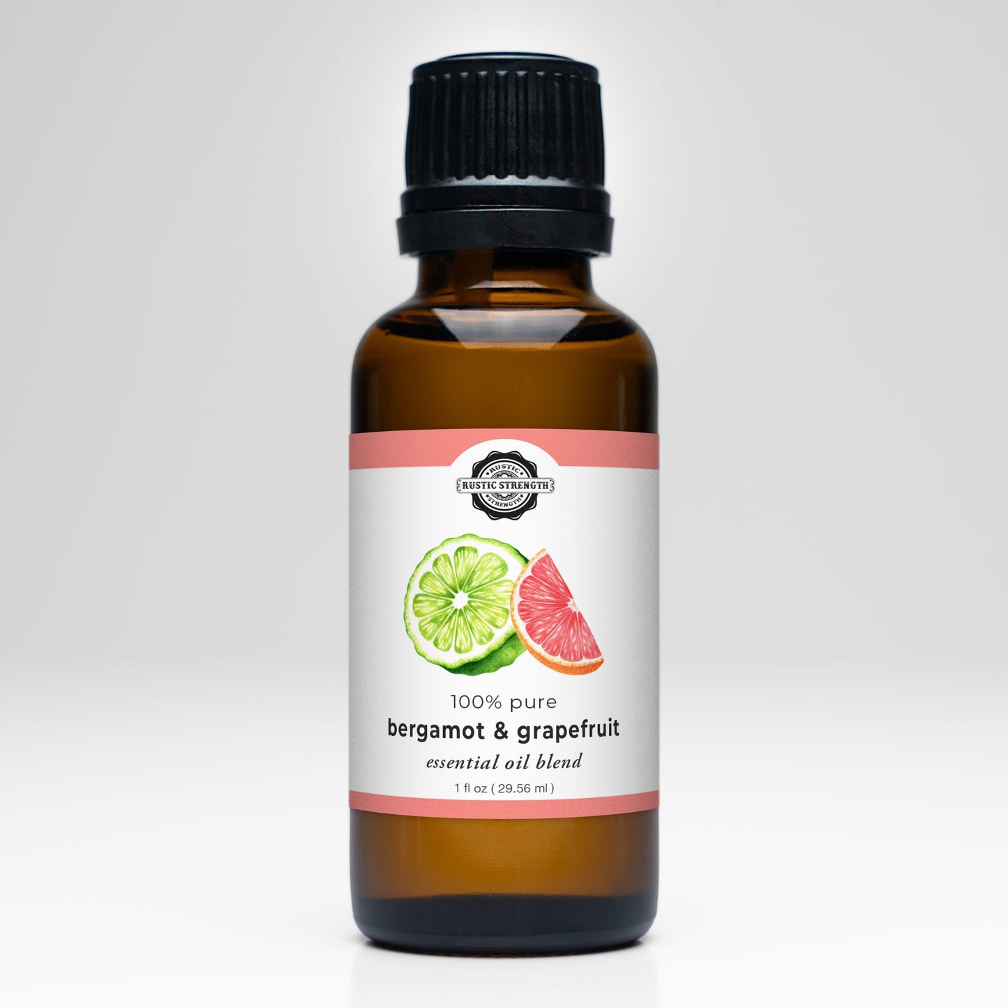 Rustic Strength Bergamot & Grapefruit Essential Oil Blend scent in a clear glass bottle with a white label and natural cork stopper.