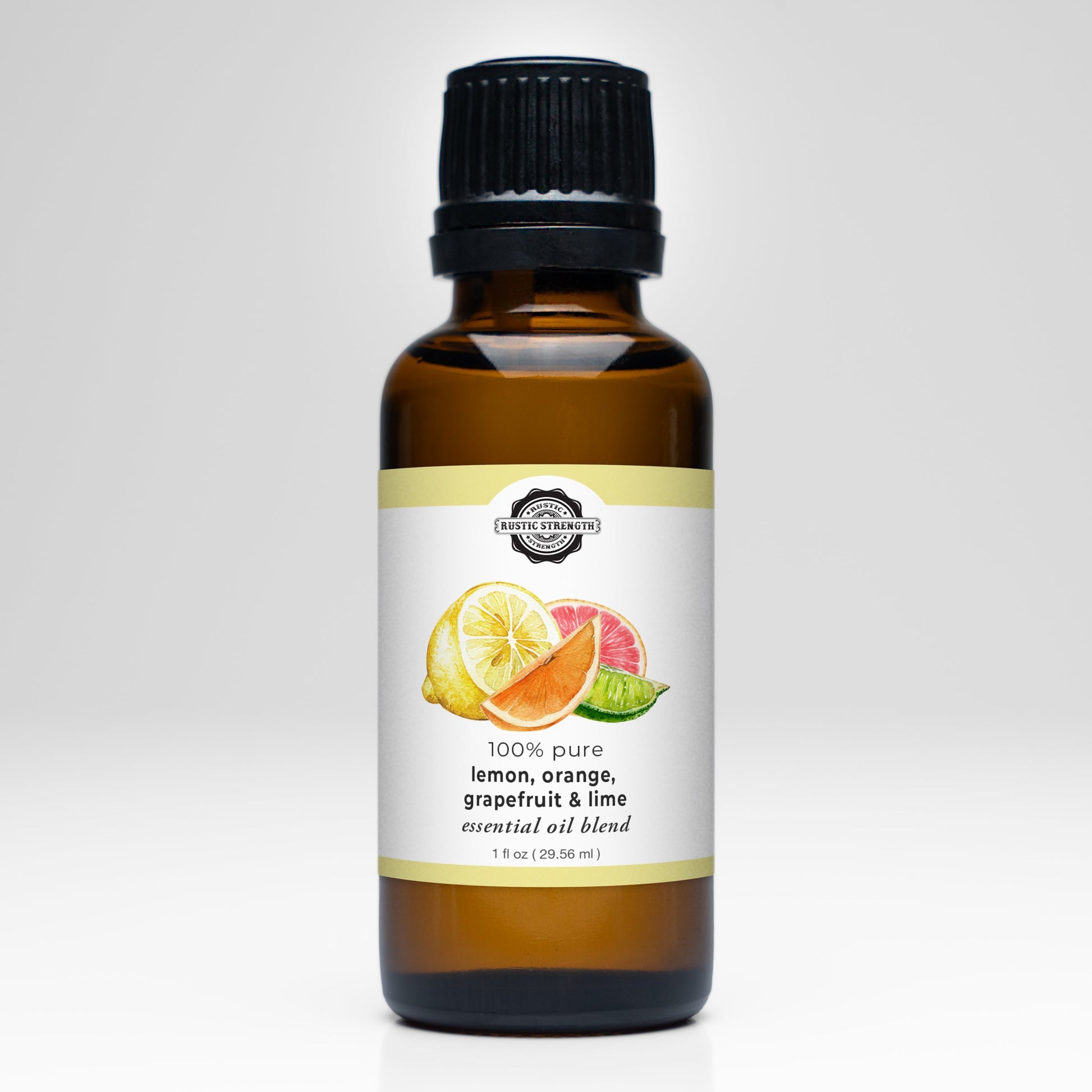 Rustic Strength citrus essential oil blend featuring lemon, orange, grapefruit, and lime in a clear glass bottle.