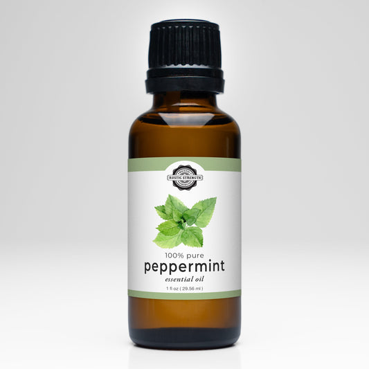 Rustic Strength peppermint essential oil scent bottle with a clear glass container and white cap, showcasing fresh mint aroma.