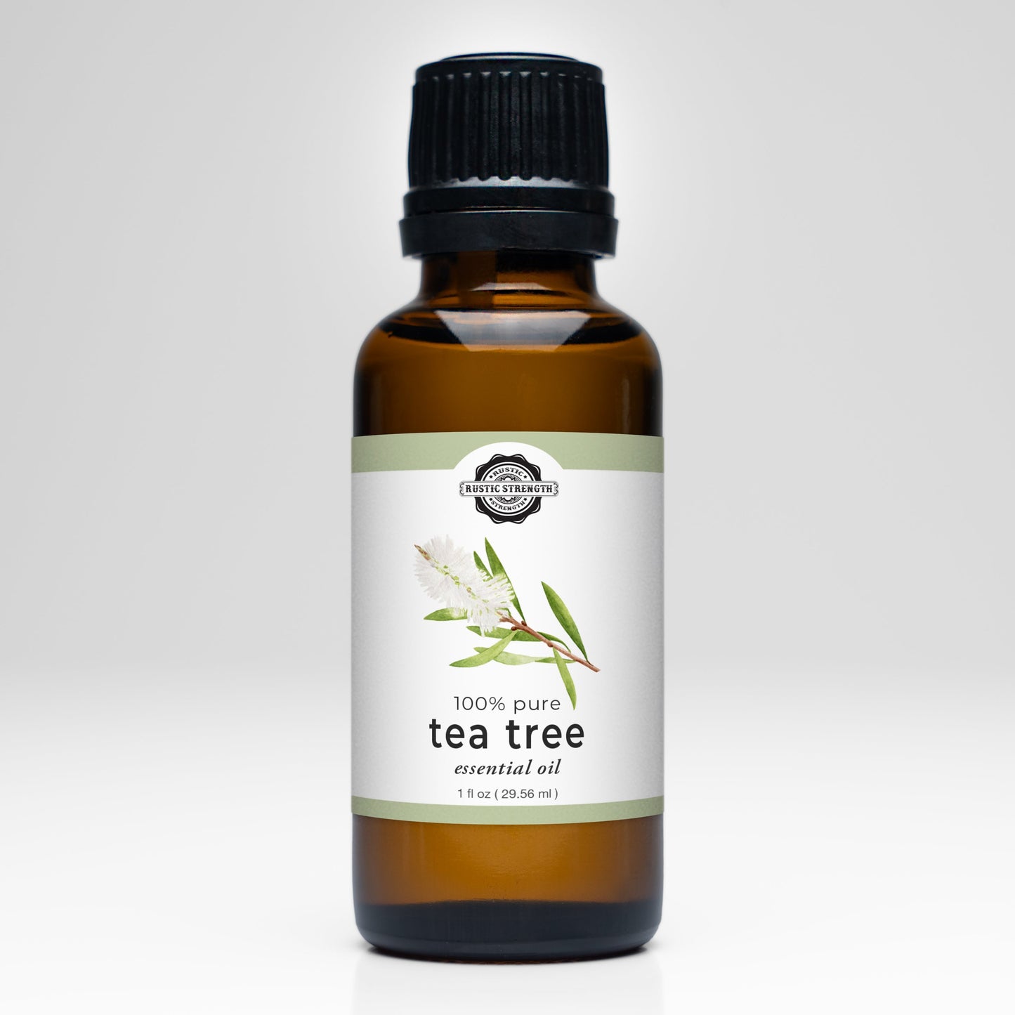 Rustic Strength Tea Tree Essential Oil scent bottle with dropper for natural aromatherapy and skin care.