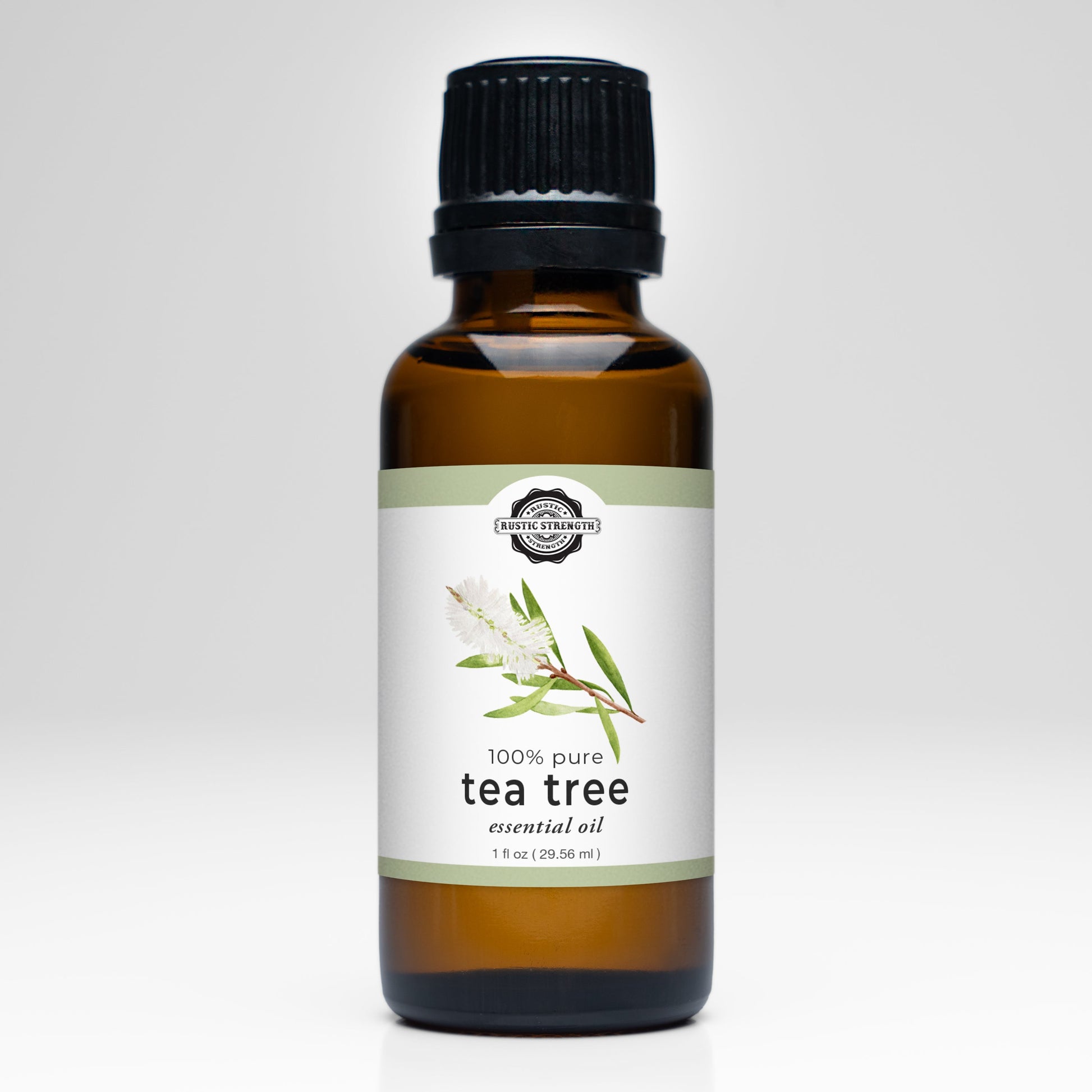 Rustic Strength Tea Tree Essential Oil scent bottle with dropper for natural aromatherapy and skin care.