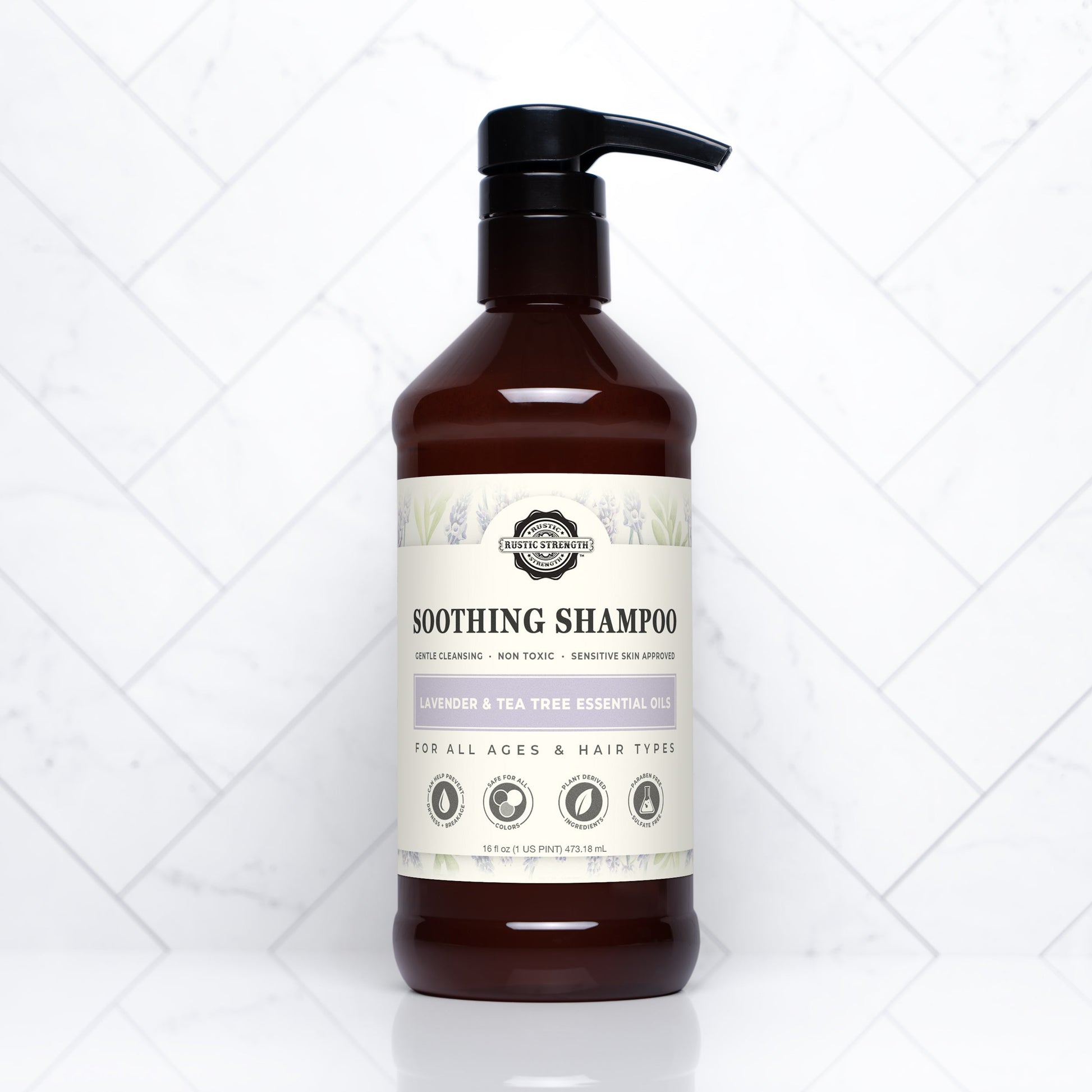 Rustic Strength Soothing Shampoo with lavender and tea tree, 16 oz bottle, showing the shampoo's natural ingredients and clear packaging.