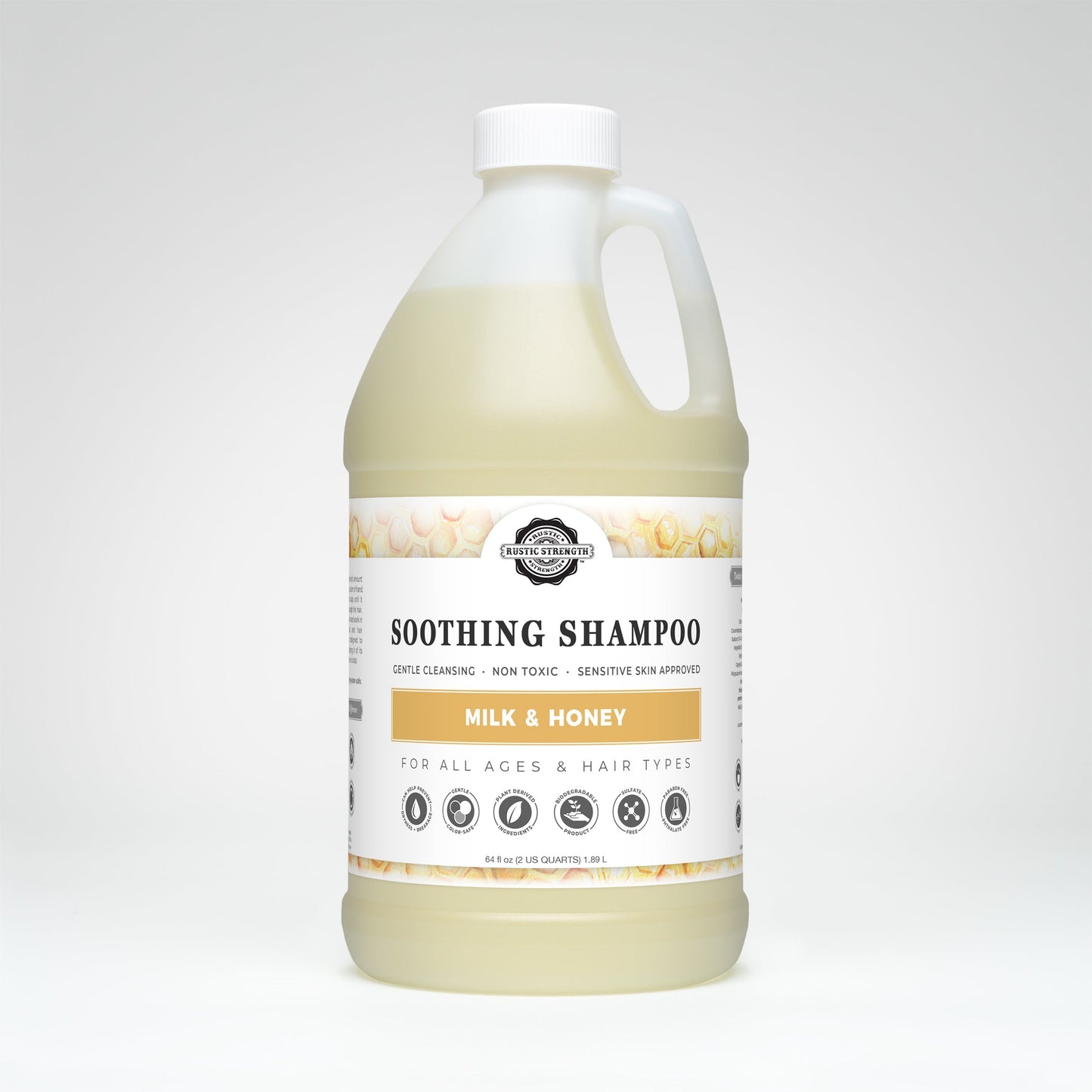 Rustic Strength Milk & Honey Soothing Shampoo in a 16 oz bottle, shown with a pump dispenser and natural ingredients visible.