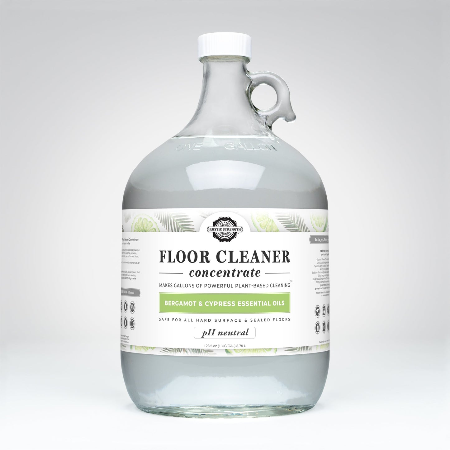 Rustic Strength Floor Cleaner Concentrate in 16 oz soap bottle with flip-top spout, scented with bergamot and cypress.