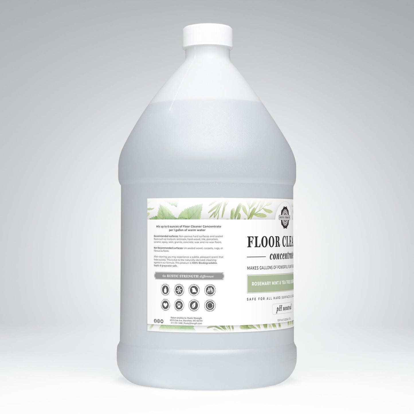 Rustic Strength floor cleaner concentrate in a 16 oz soap bottle with flip-top spout, scented with rosemary, mint, and tea tree.