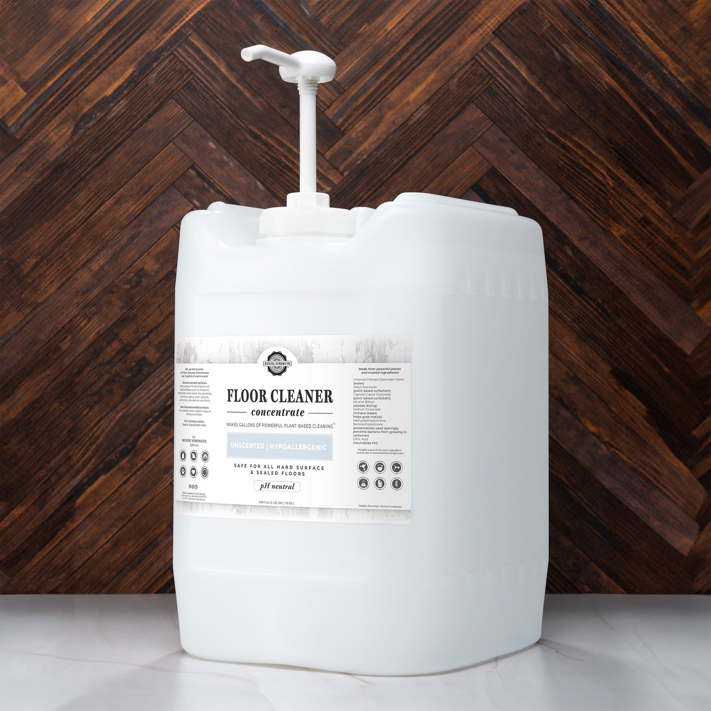 Rustic Strength unscented floor cleaner concentrate soap in a 16 oz bottle with flip-top spout for easy pouring.