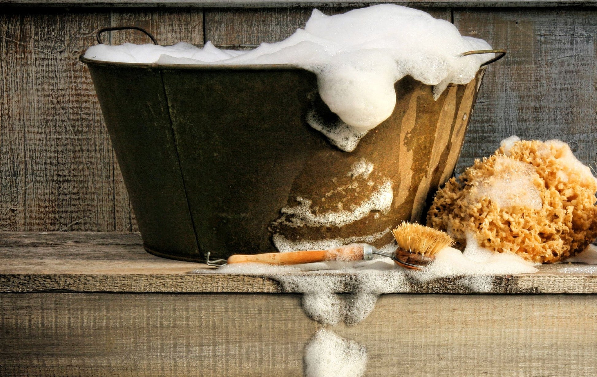 Assorted organic handmade soap bars in a sample pack from Sweet Harvest Farms, featuring natural textures and earthy colors.