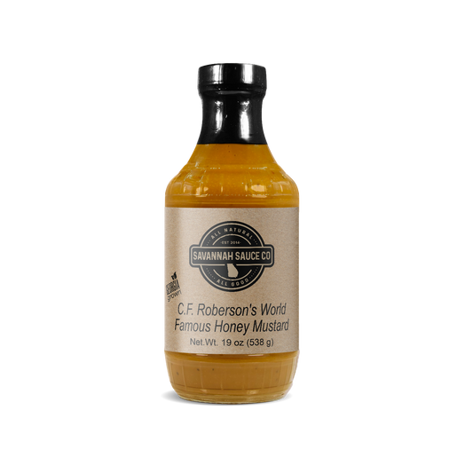 SavannahSauceCompany gourmet honey mustard sauce in a jar with a label, showcasing C.F. Roberson’s World Famous Honey Mustard.
