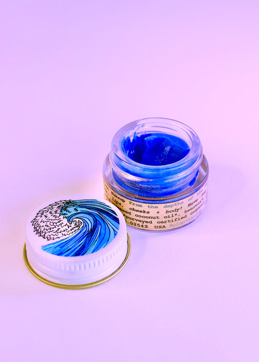 Plant Makeup SEA Lip Balm for body makeup, featuring a natural balm tube with sea-inspired ingredients and branding.