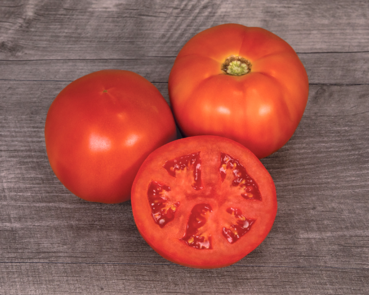 Packet of Seeds 'n Such Mountain Man Hybrid Tomato Seeds showing 12-15 seeds in a colorful packet.