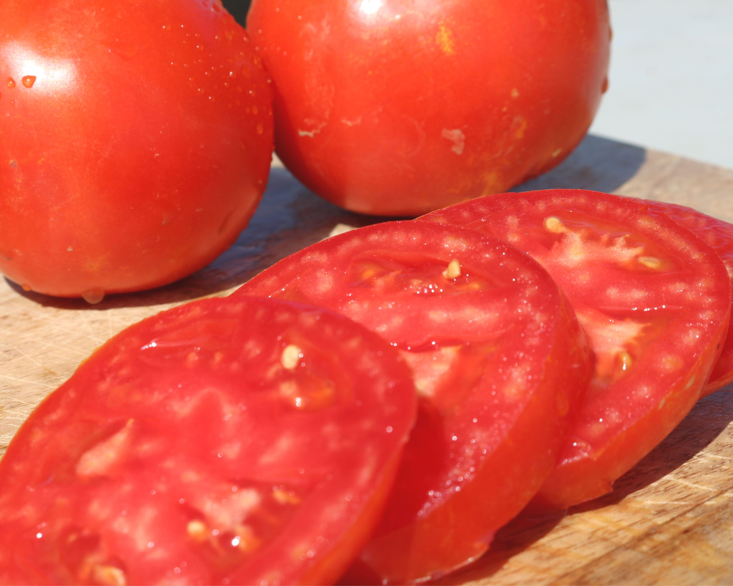 Packet of Husky Red Hybrid Tomato Seeds from Seeds 'n Such, featuring 15-20 seeds for planting.