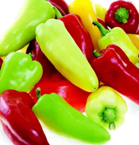 Packet of Pretty N Sweet Hybrid Pepper Seeds by Seeds 'n Such, showing vibrant seed packet with seeds and colorful pepper illustrations.