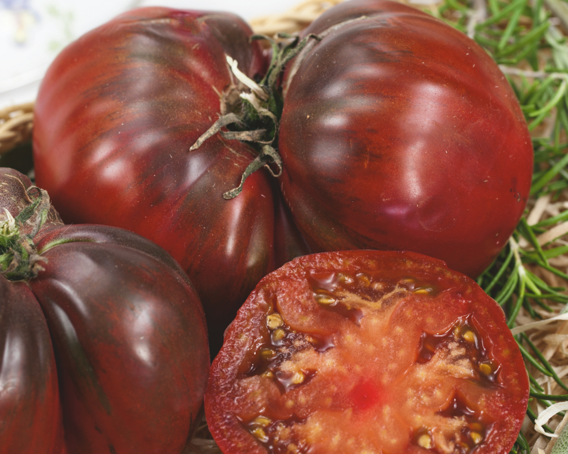 Packet of Seeds 'n Such Black Krim Tomato Seeds showing 30 seeds in a clear packet for planting and gardening.