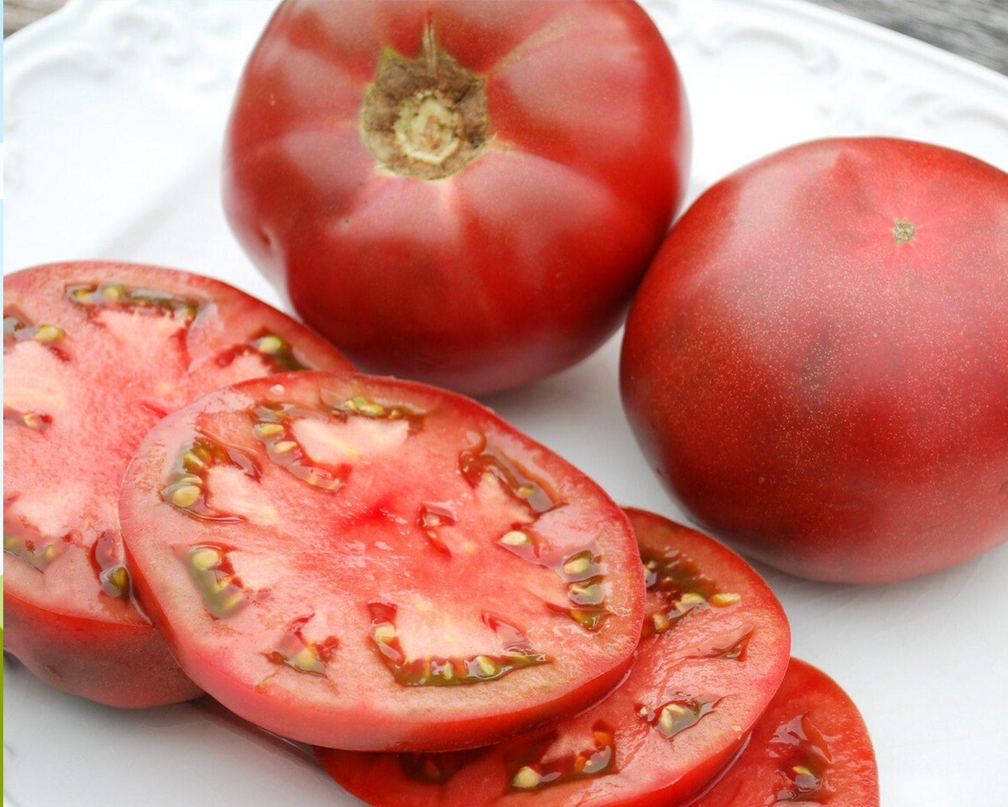 Packet of Seeds 'n Such Cherokee Purple Tomato Seeds showing 30 seeds in a colorful packet for planting.