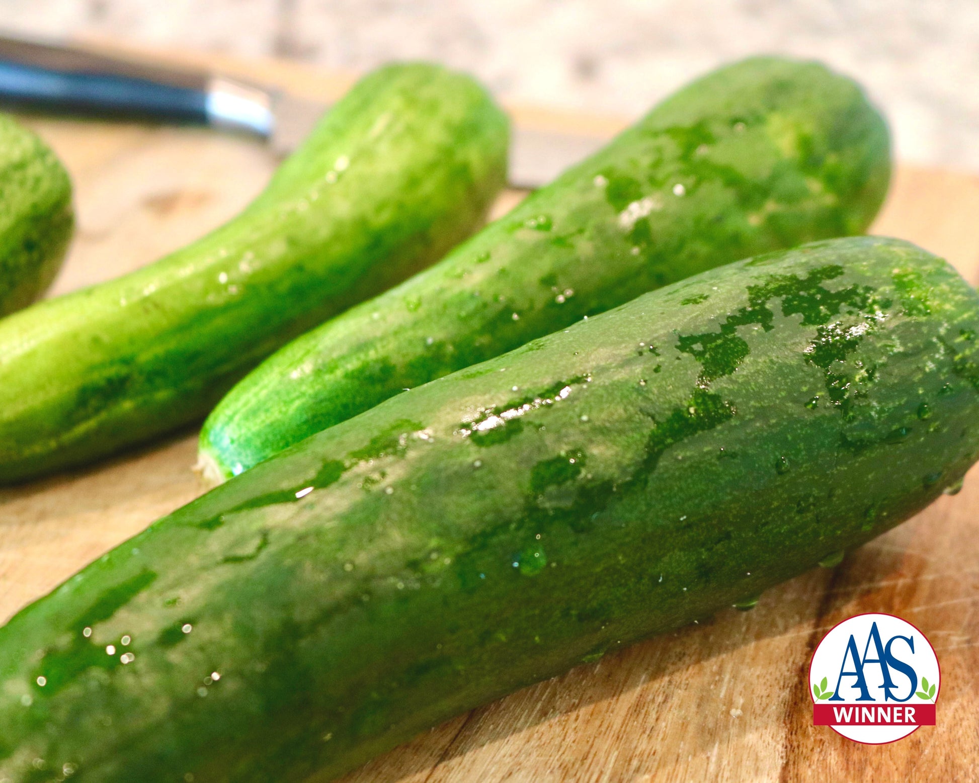 Packet of Seeds 'n Such Sweet Success Hybrid Cucumber Seeds showing five cucumber seed packets in the image.