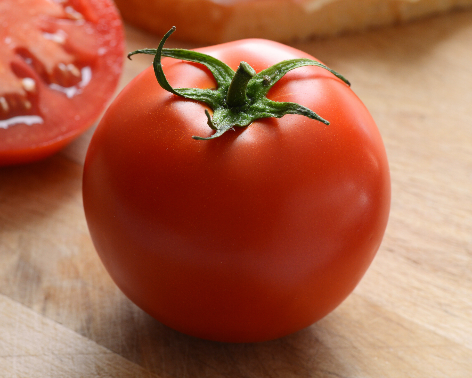 Packet of Seeds 'n Such Stellar Hybrid Tomato Seeds showing eight seed units in a clear packet for planting.