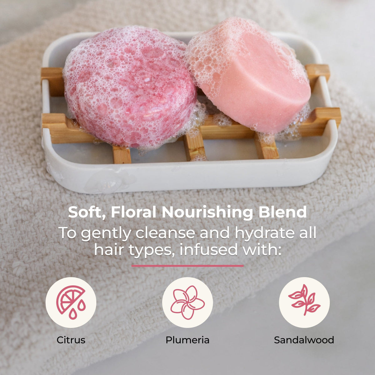 ZeroWasteStore blossom-scent shampoo and conditioner bar duo with eco-friendly packaging, perfect for sustainable hair care.