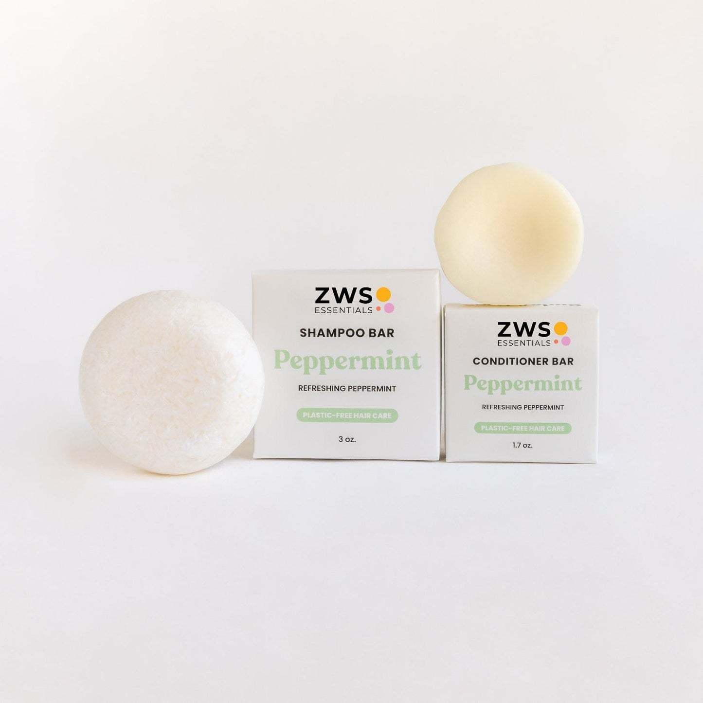 Peppermint Breeze shampoo and conditioner bar duo from ZeroWasteStore.com, showing eco-friendly hair care set with green packaging.